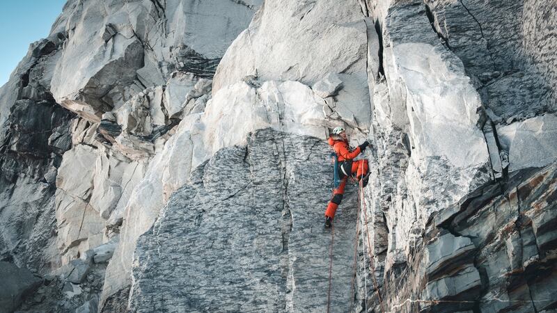 Jost Kobusch climbs a difficult rock section on the lower part of the West Ridge of Everest in January 2020. Photograph: Daniel Hug via The New York Times