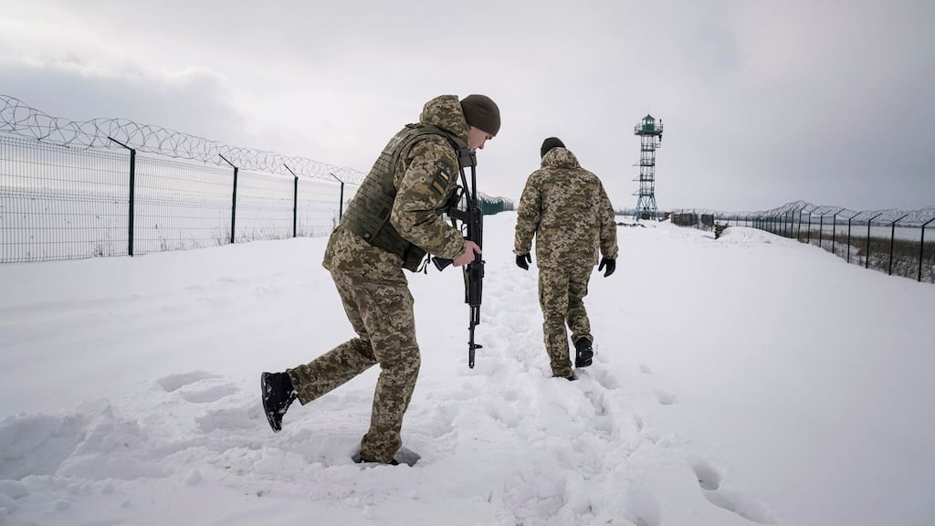 Ukrainian border guards patrol the border with Russia not far from Hoptivka village, Kharkiv region, Ukraine. Photograph: Evgeniy Maloletka/AP Photo