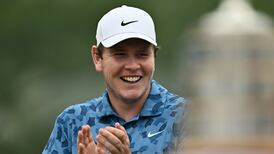 Different Strokes: McIntyre announces his return to golf by handing out Scottish chocolate bars
