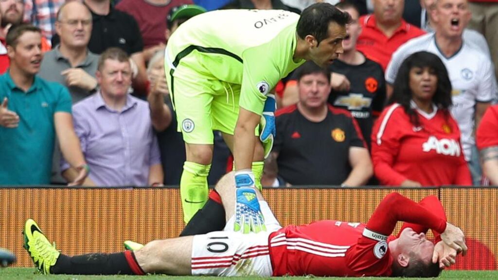 Manchester United’s Wayne Rooney after a challenge from Manchester City’s Claudio Bravo during the side’s Premier League clash at Old Trafford. Photo: Phil Noble/Reuters