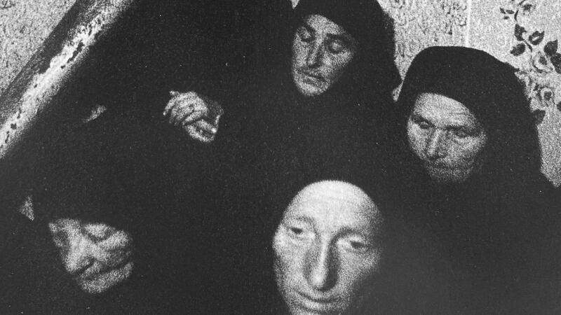 Five women with black headscarves in corner of room. Å umiac 1969. Photograph: Markéta LuskaÄ?ová.