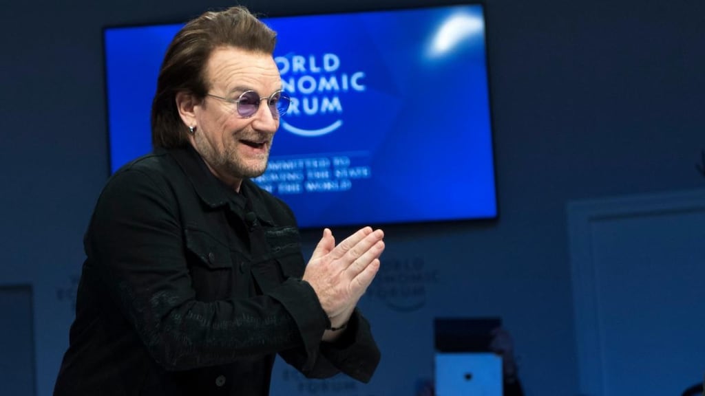 Capitalism is “a wild beast”: U2 frontman Bono takes centre stage in a panel session at the World Economic Forum in Davos. Photograph: Laurent Gillieron/Keystone via AP