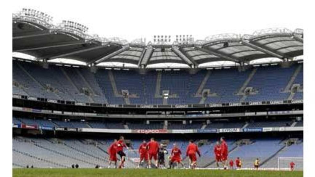 The Welsh squad limber up for today's Group D game against the
Republic of Ireland in the special surroundings of Croke Park
yesterday.