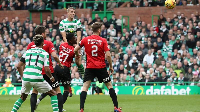 Jozo Simunovic heads home for Celtic in the Scottish Premiership game against at Celtic Park. Photograph: Ian MacNicol/Getty Images