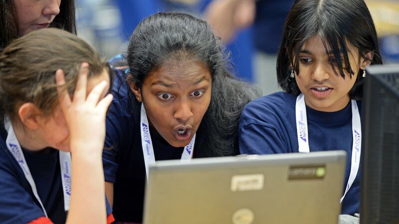 Emma Brady (11), Scoil Mhuire, Cavan, Prethiksha Muthumanickam (12), St Mary’s Edenderry, Co Offaly, and Anoushka Vinod (11), Scoil Rois, Co Galway, taking part in “LearnStorm” in Dublin. Photograph: Eric Luke/The Irish Times