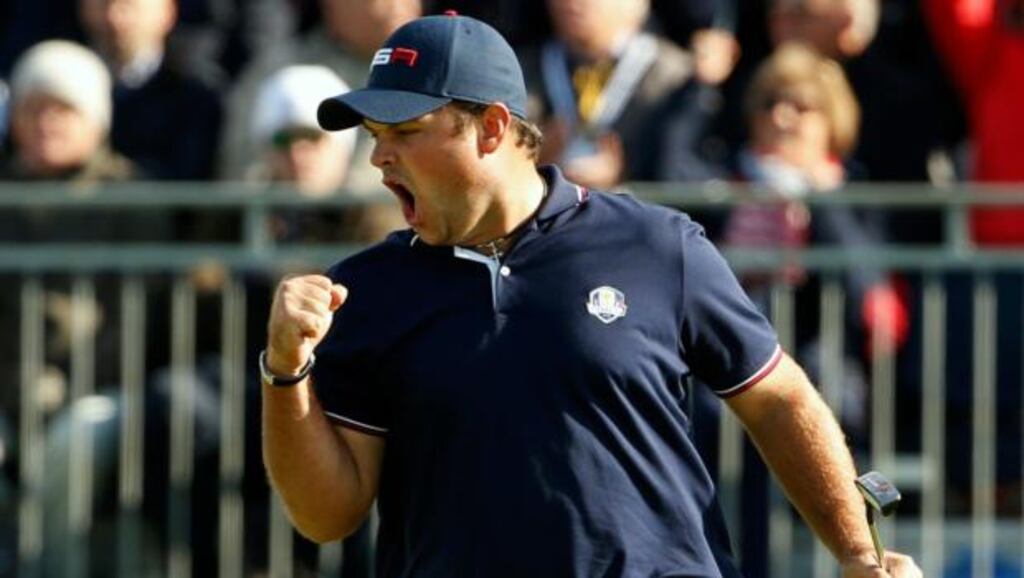 Patrick Reed after making his putt to win the 13th hole. Photograph: Phil Noble/Reuters