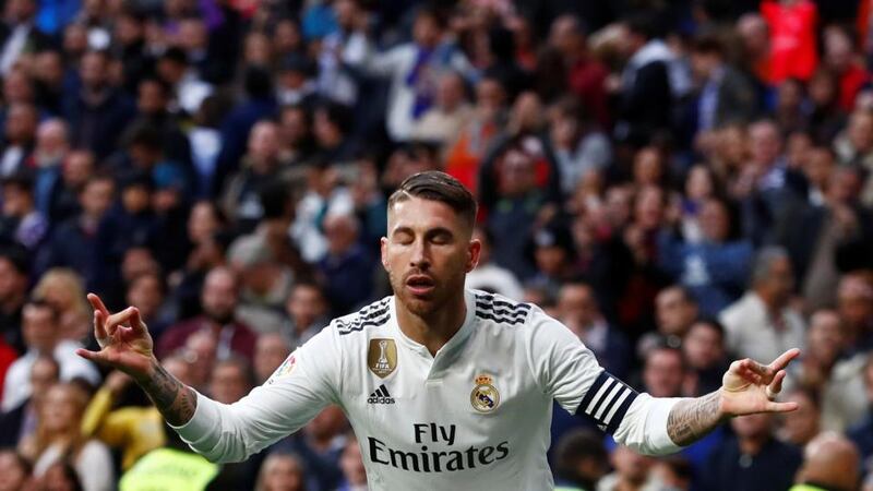 Real Madrid’s Sergio Ramos celebrates scoring from the penalty spot. Photograph: Juan Medina/Reuters
