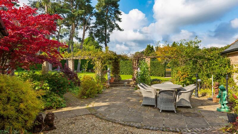 The gardens provide year-round interest and colour thanks to the planting of Japanese maples, roses and agapanthus.