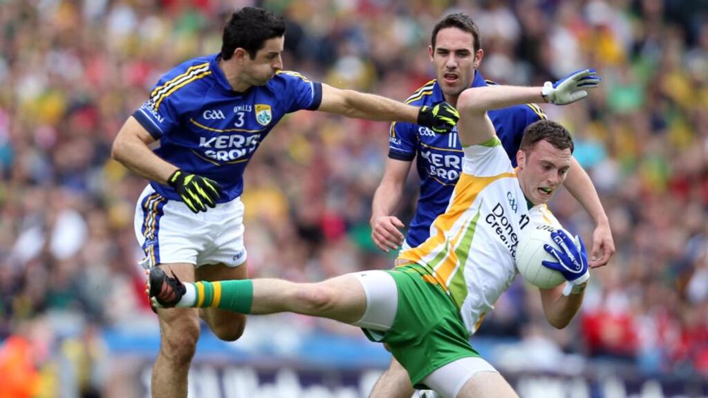 Donegal’s Leo McLoone is challenged by Aidan O’Mahony of Kerry in 2012’s All Ireland senior football championship quarter-final in Croke Park, which the northerners won en route to an All-Ireland title. Photograph: Colm O’Neill/Inpho