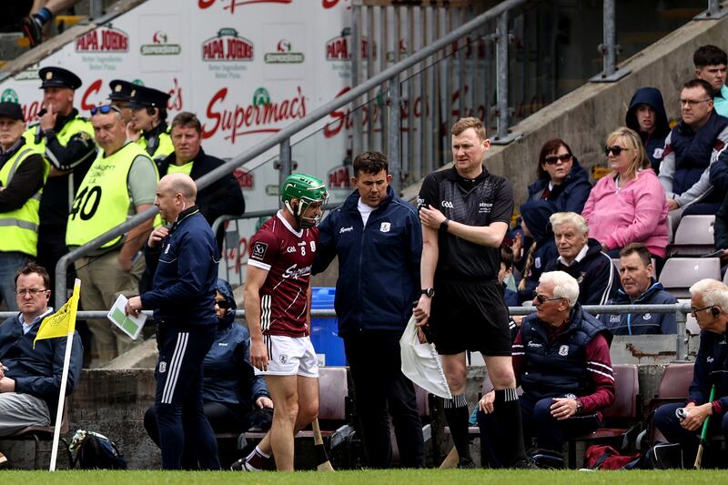 Galway's David Burke leaves the field due to a red card. Photograph: Ben Brady/Inpho