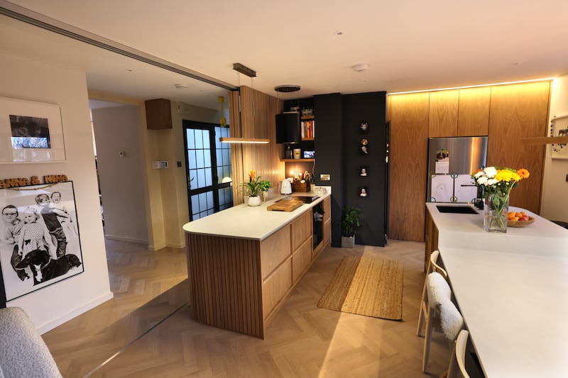 No corner is wasted in the kitchen. A small utility room is hidden behind a cupboard door in the corner. Photograph: Dara Mac Dónaill