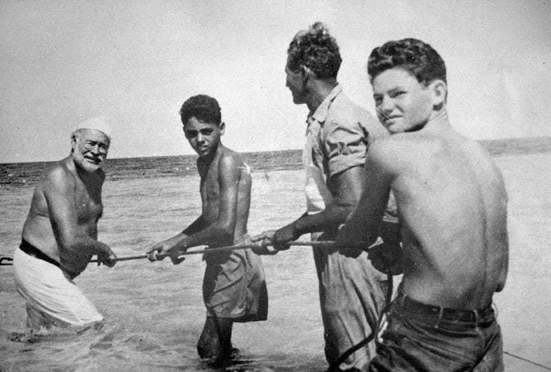 The Old Man and the Sea: Ernest Hemingway with Gregorio Fuentes and two local boys in Cuba. Photograph: Françoise Demulder/Roger Viollet via Getty
