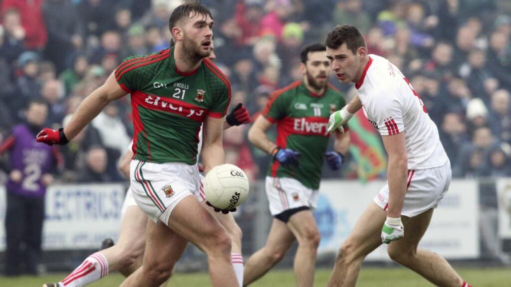 Mayo’s Aidan O’Shea plays one of the many hand-passes in the recent Allianz Football League clash against Tyrone.   Photo: Mike Shaughnessy/Inpho
