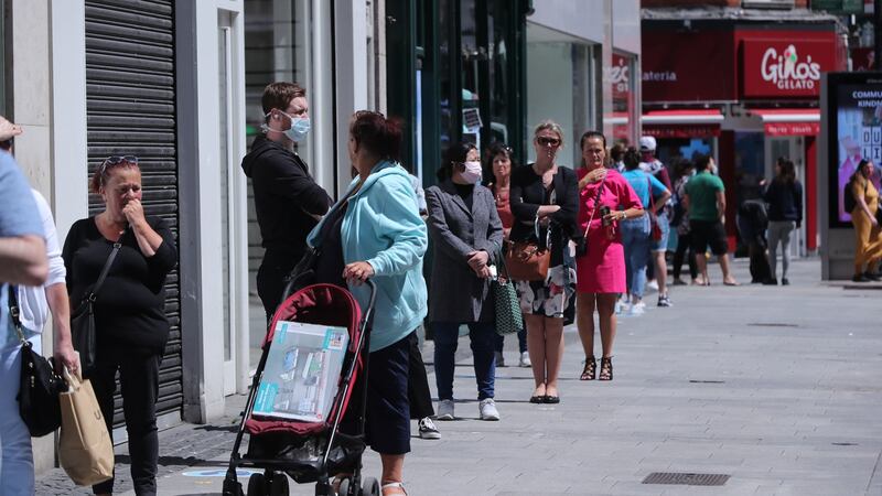 People queueing outside Dunnes Stores in Dublin city centre on Monday. Photograph: Niall Carson/PA Wire