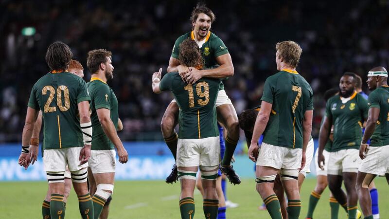 South Africa’s lock Eben Etzebeth (top) celebrates with RG Snyman after the Springboks’ win over Italy. Photograph: Adrian Dennis/AFP/Getty