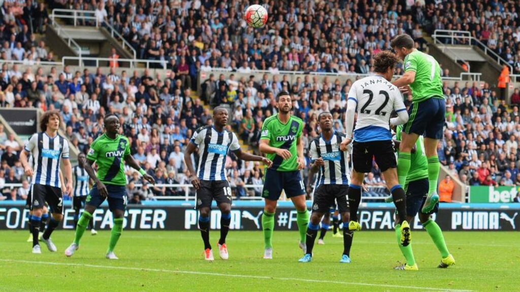 Southampton striker  Shane Long gets above Newcastle’s Daryl Janmaat to head home the equalising goal during the   Premier League match at  St James’ Park. Photograph: Nigel Roddis/Getty Images