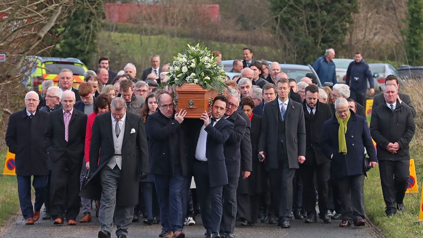 The coffin of Seamus Mallon, the former deputy first minister of Northern Ireland, is carried to Saint James of Jerusalem Church in Mullaghbrack, Co Armagh. Photograph: Liam McBurney/PA