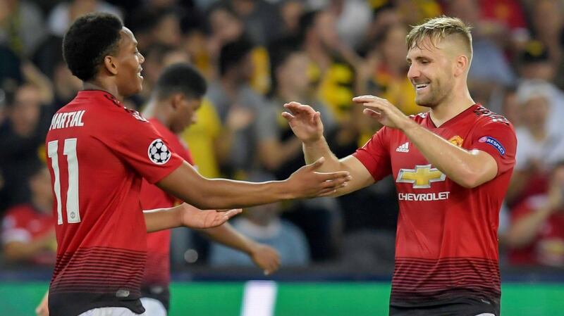 Luke Shaw congratulates Anthony Martial after the French forward scored Manchester United’s third in Bern. Photograph: Alessandro Della Valle/EPA