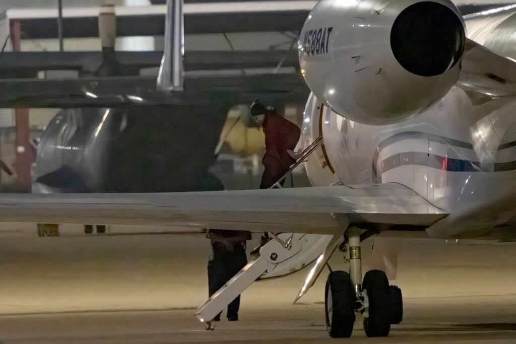 US basketball star Brittney Griner gets out of a plane after landing at San Antonio, Texas. Photograph: SUZANNE CORDEIRO/AFP via Getty Images
