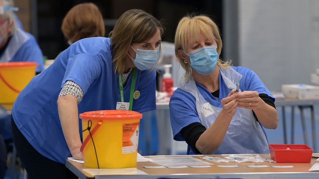 Nurses prepare vaccine jabs at the Lakeland Forum vaccination centre in Enniskillen, Northern Ireland, on March 12th. Photograph: Charles McQuillan/PA Wire