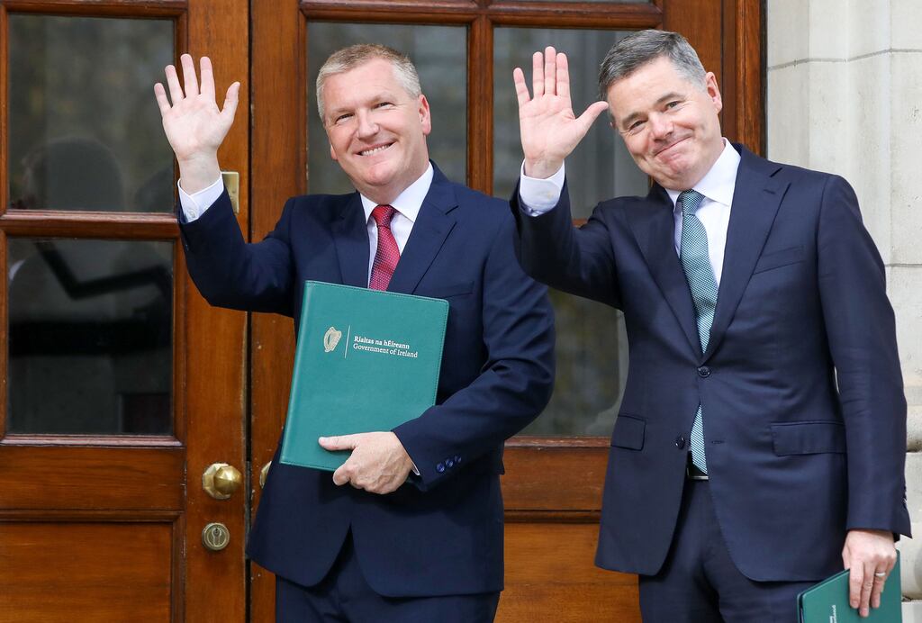 Ireland's Finance Minister Michael McGrath (L) and Ireland's Public Expenditure Minister Paschal Donohoe, pose during a photocall prior to presenting the 2024 Irish Budget to Parliament at Government Buildings in Dublin on October 10, 2023. (Photo by PAUL FAITH / AFP) (Photo by PAUL FAITH/AFP via Getty Images)