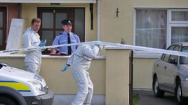 Two held as body of man found in Carlow house