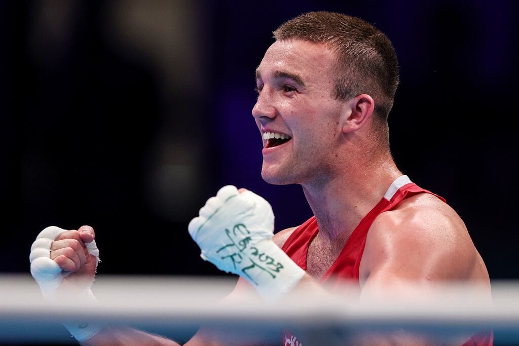 Ireland’s Jack Marley celebrates after being declared the winner over Spain's  Enmanuel Reyes Pla in their heavyweight semi-final at the European Games in Poland. Marley has now qualified for the Olympic Games. Photograph: Tom Maher/Inpho