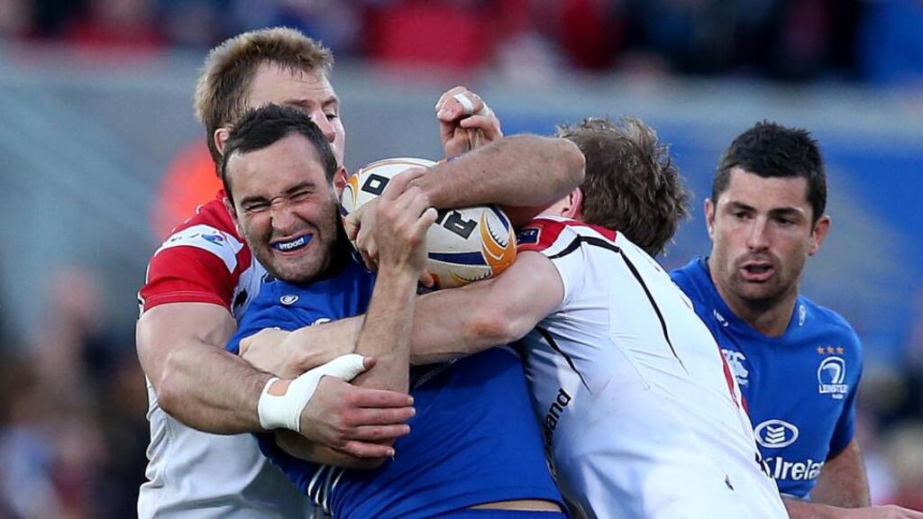 Leinster’s Dave Kearney is tackled by Andrew Trimble and Roger Wilson of Ulster during this month’s RaboDirect Pro12 league clash at Ravenhill. Photo: Dan Sheridan/Inpho