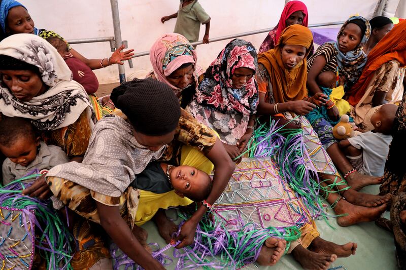 Women and children in a tent for displaced people in Oromia, Ethiopia. Photograph: Hannah McCarthy