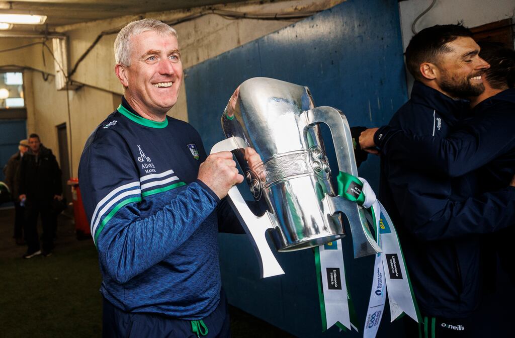 Limerick’s manager John Kiely celebrates with the Mick Mackey Cup last year. Photograph: James Crombie/Inpho