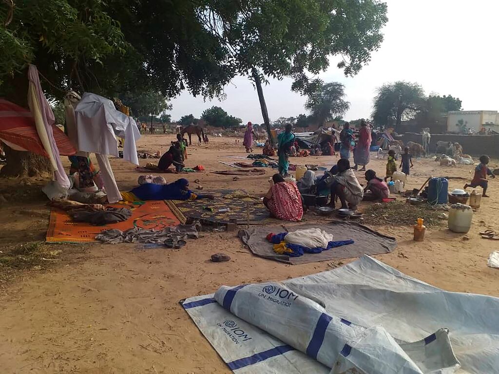 Residents displaced from a surge of violent attacks gather in the village of Masteri in west Darfur, Sudan Photograph: Mustafa Younes/AP