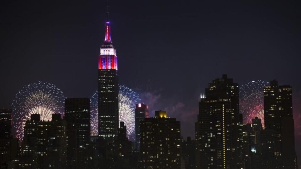Fireworks lighting up the Empire State Building along the Manhattan skyline during Fourth of July celebrations. Photograph: John Minchillo/AP Photo