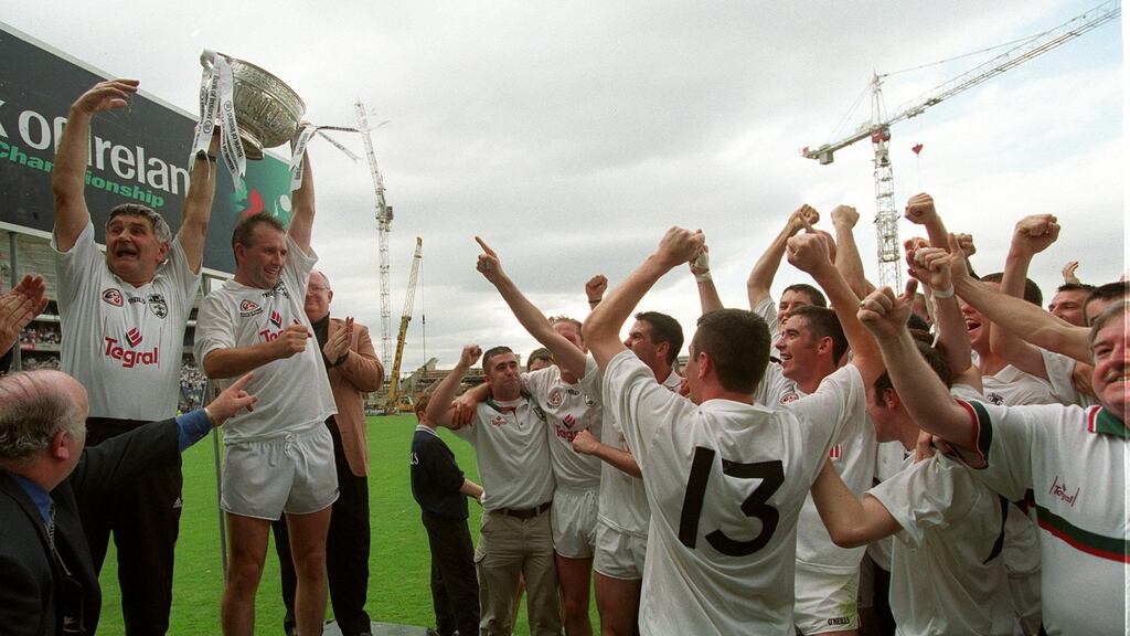 Kildare manager Mick O’Dwyer and captain Glen Ryan celebrate Kildare’s Leinster final replay win over Dublin in 2000. Photograph: Billy Stickland/Inpho
