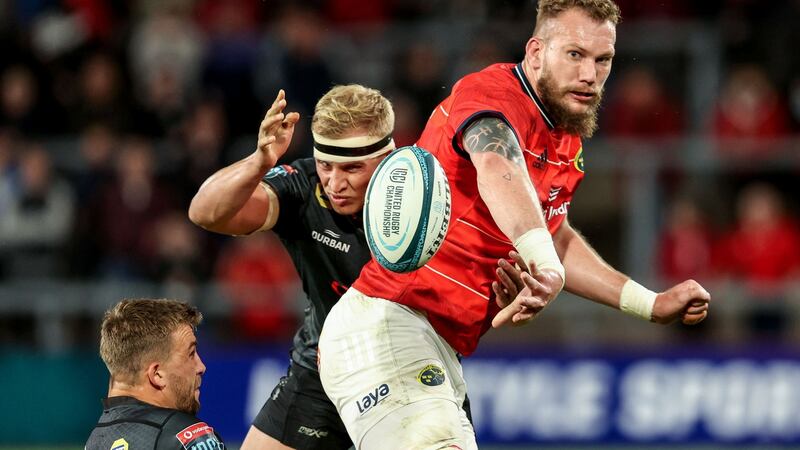 Munster’s RG Snyman offloads during the game against the Sharks. Photograph: Dan Sheridan/Inpho