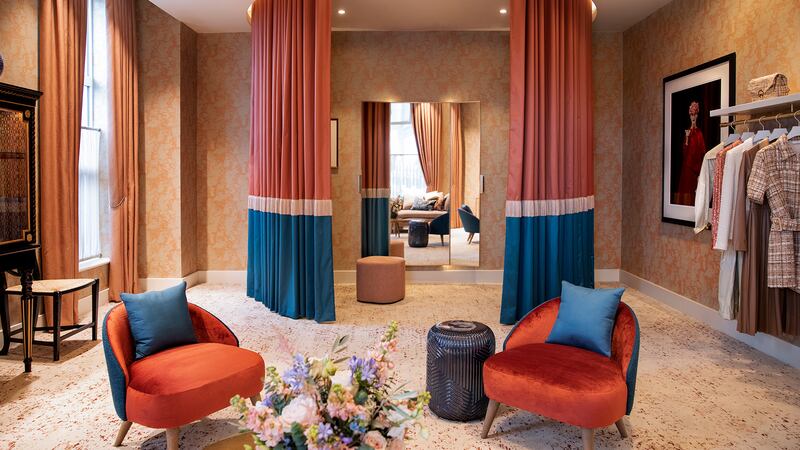 The glamorously refurbished personal shopping suites offer space to try on new looks in private.