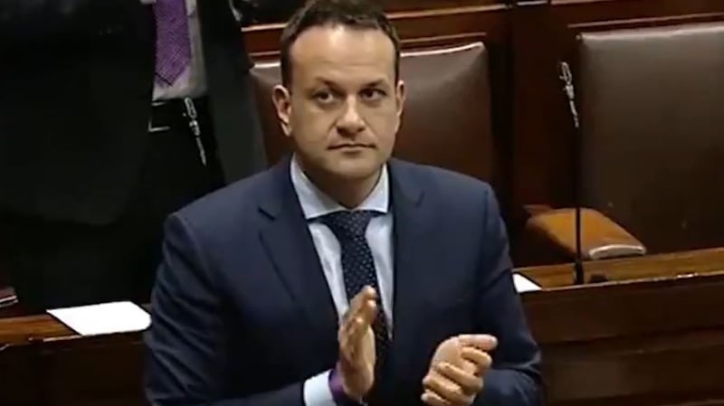 The Taoiseach claps with other TDs in the Dáil on Thursday night in appreciation of healthcare workers. Image: Oireachtas TV