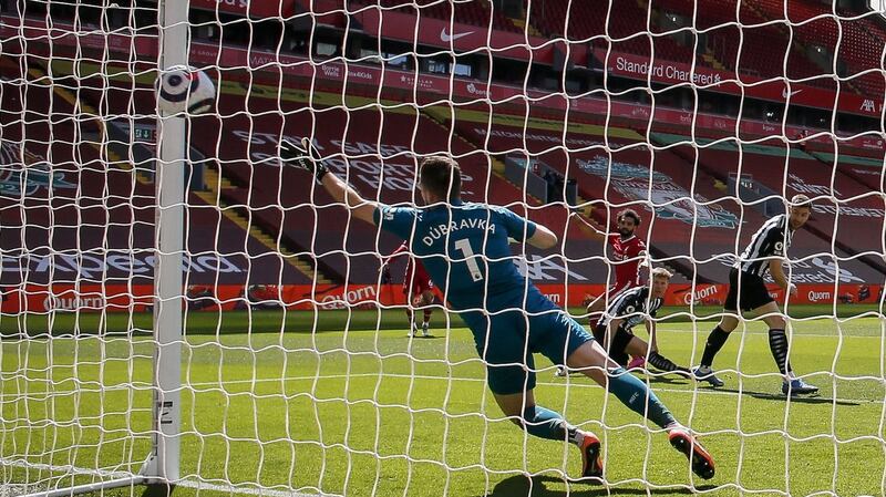 Mohamed Salah scores the opener. Photo: David Klein/EPA