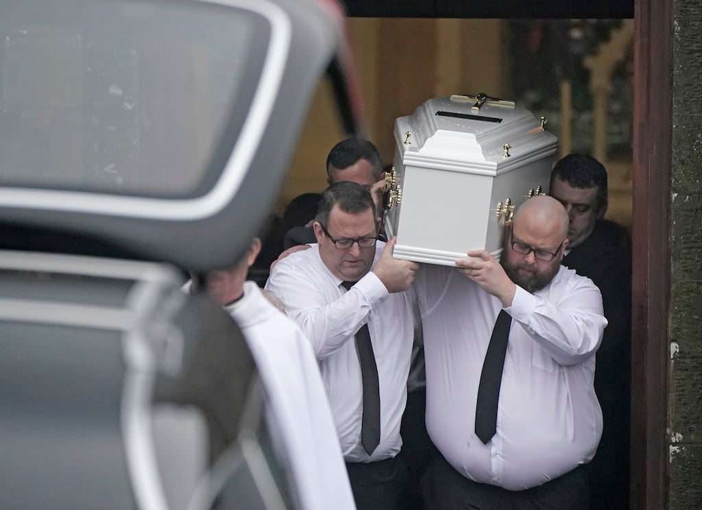 Matthew Healy funeral: The coffin of  the six-year-old boy is carried out of the Church of the Immaculate Conception in Watergrasshill by his father James (front right) and uncle Dan. Photograph: PA