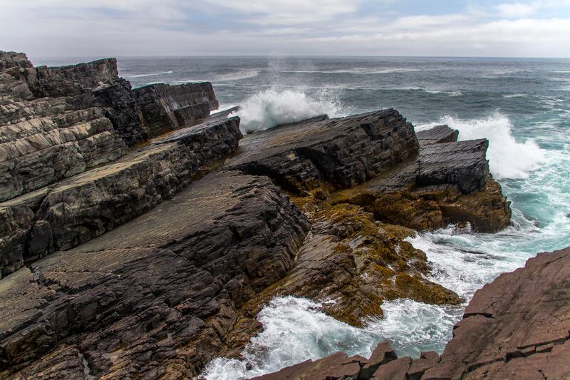 Irish Loop: layers of rock layers and heavy surf at Mistaken Point. Photograph: CarbonBrain/iStock/Getty