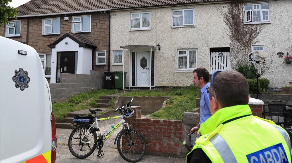 Gardaí during their investigation outside the home of Patricia O’Connor in Mountain View Park, Rathfarnham. Her body was found scattered over the Dublin mountains. Photograph: Colin Keegan, Collins
