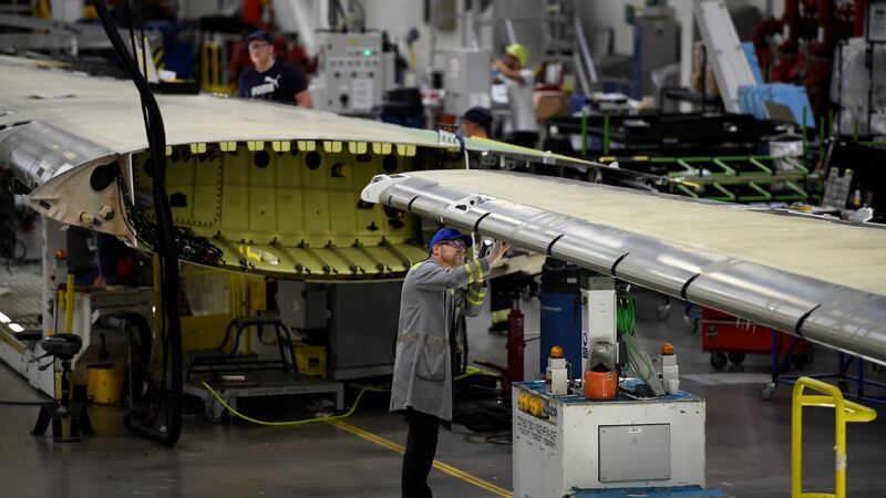A worker inspecting an aircraft wing in a Bombardier factory in Belfast. The Canadian aerospace giant announced plans to sell its aerostructures business in Belfast earlier this year. Photograph: Reuters/Clodagh Kilcoyne