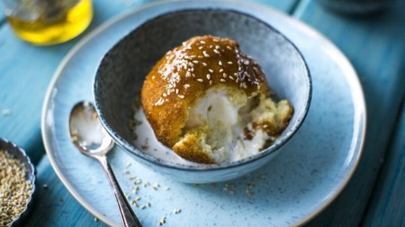 Deep-fried ice-cream balls with honey and toasted sesame