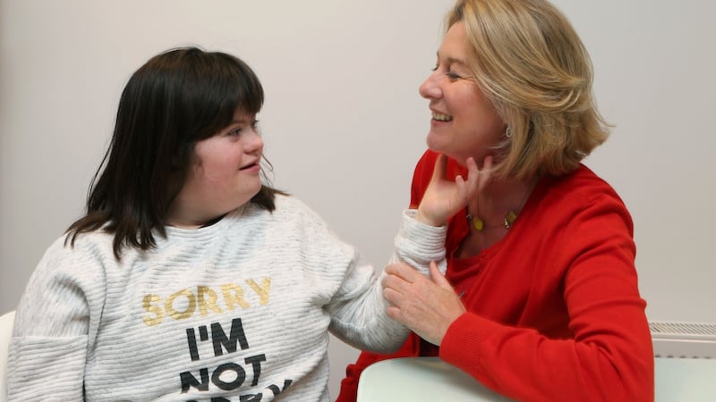 Róisín Lavelle (15) with her mother Marian at their home in Galway. “She’s a happier child – more content – and Michelle has brought that out in her.” Photograph: Joe O’Shaughnessy