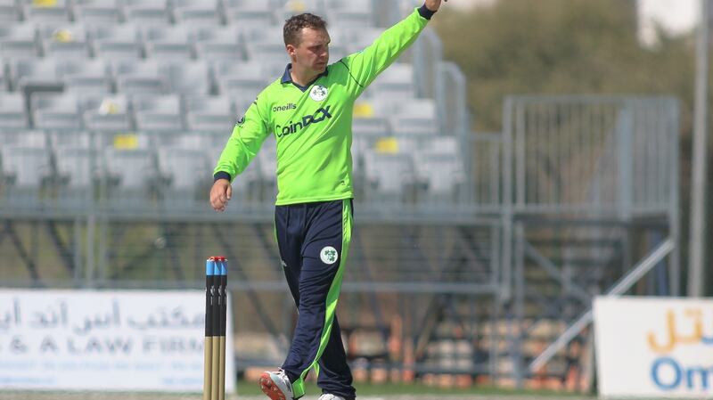 McBrine celebrates taking a wicket. He ended up with two. Photograph: Kaushal Adhikari