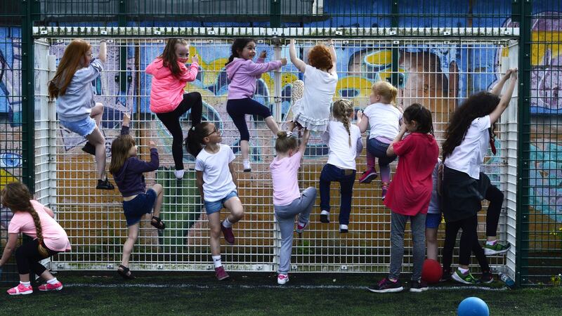 The girls monkey around during the photo shoot. Photograph: Cyril Byrne