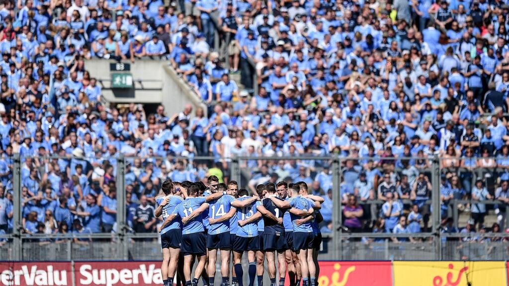 The Dublin team gather in a huddle in front of Hill 16 ahead of the Leinster football final against Westmeath last July. Photograph: Tommy Grealy/Inpho