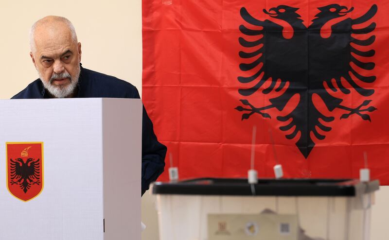 Albanian prime minister Edi Rama prepares to cast his ballot at a polling station in Tirana on Sunday