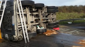 Major delays on M50 as cement truck overturns