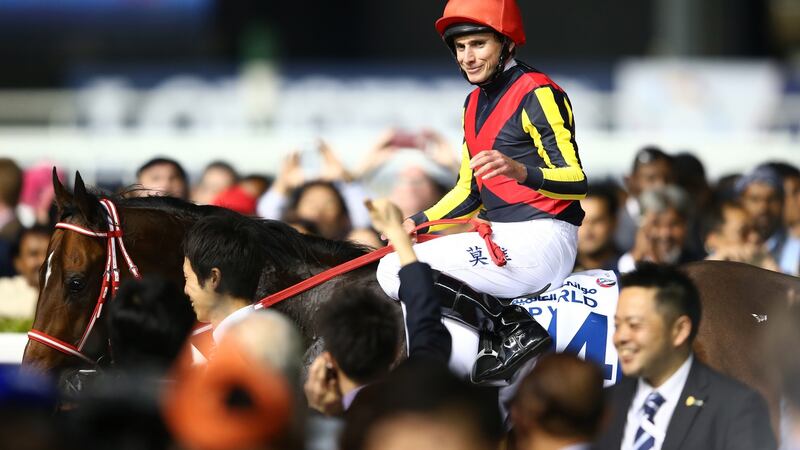 Ryan Moore celebrates after riding Real Steel to victory in the Dubai Turf at Meydan racecourse in Dubai. Photograph: Francois Nel/Getty Images