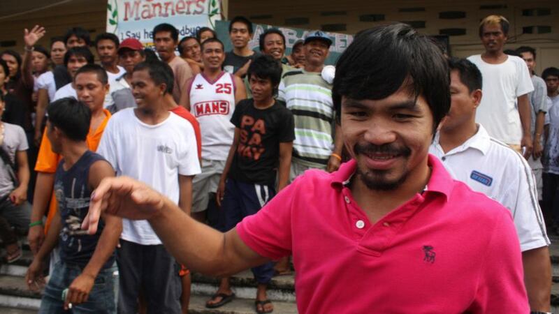 Manny Pacquiao says he will pray for Floyd Mayweather. Photograph: Reuters